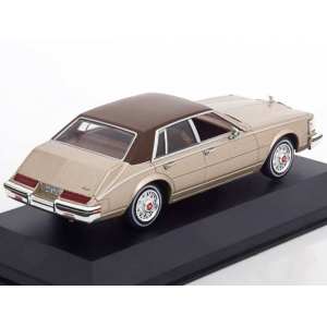 1/43 Cadillac Seville MK II Elegante 1980 золотистый с коричневым