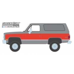 1/64 GMC Jimmy (Lifted) 1984 white with orange