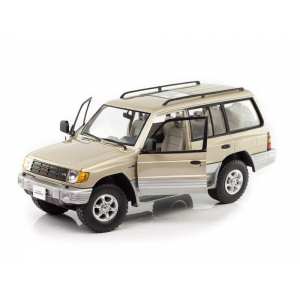 1/18 Mitsubishi Montero (Pajero II) Long 3.5 V6 1998, sudan beige metallic золотистый